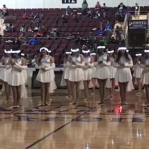 High School Dance Team Lines Up In Gym – Crowd Goes Wild When Lights Go Out