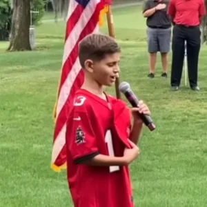 Emotional Impact: 10-Year-Old Wows with National Anthem, Brings Tears to Grown Men”