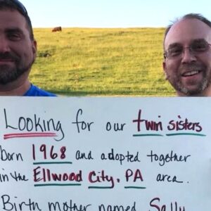 Reunited brothers create sign to find twin sisters and are amazed when it works