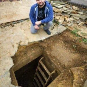 Homeowner stunned when hole in his driveway reveals a WW2 air raid shelter